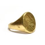 A GENT'S 9CT GOLD PLAIN SIGNET RING The oval head initialled, weighing approx. 10.7g Condition