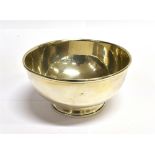 A SILVER BOWL OF PLAIN ROUND FORM On pedestal base with rolled rim, monogrammed initials and 1913