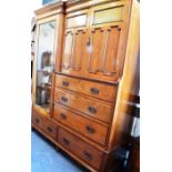 A VICTORIAN WALNUT WARDROBE with dentil moulded frieze, the left door later fitted with bevelled