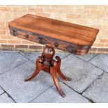 AN EARLY VICTORIAN ROSEWOOD TEA TABLE the top with reeded edge, the frieze with carved decoration,