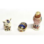 THREE ROYAL CROWN DERBY PAPERWEIGHTS a sitting piglet, bird and Millenium bug, all complete with