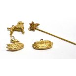 THREE 9CT GOLD LOOSE CHARMS and a 9ct gold three legged Manx stick pin, the charms comprising a
