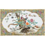 A CHINESE PORCELAIN PLAQUE the central shaped reserve polychrome enamelled with a scene of birds