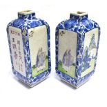 A PAIR OF CHINESE BOTTLE VASES of square section, each vase painted with mountainous landscape