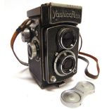 A YASHICAFLEX TWIN LENS REFLEX CAMERA with Yashimar 1:3.5 f=80mm viewing and taking lenses.