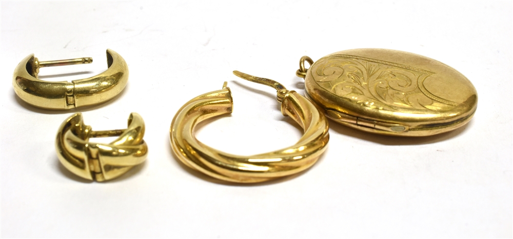 THREE ODD 9CT GOLD EARRINGS and a 9ct gold back and front locket, the earrings weighing a total of