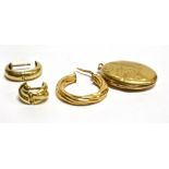 THREE ODD 9CT GOLD EARRINGS and a 9ct gold back and front locket, the earrings weighing a total of