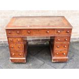 A MAHOGANY TWIN PEDESTAL DESK of small proportions, 104cm wide 58cm deep 73cm high