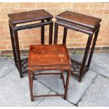 A PAIR OF CHINESE HARDWOOD OCCASIONAL TABLES with relief carved decoration, ornate undertier