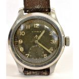 A CYMA WW11 BRITISH MILITARY ISSUE STEEL WRIST WATCH Illuminous infill Arabic numerals and hands
