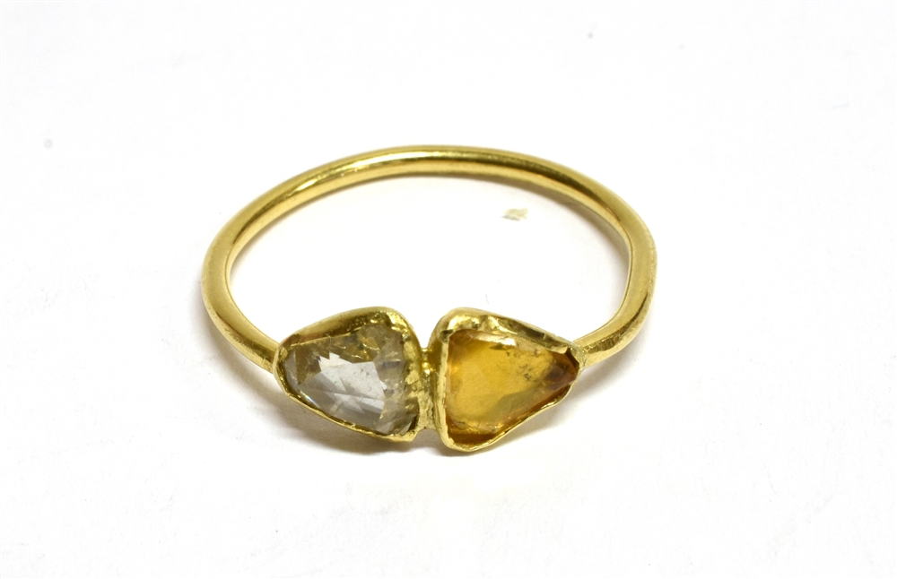 A DIAMOND AND YELLOW TOPAZ TWO STONE YELLOW GOLD RING the triangular rose cut diamond approx. 0.5