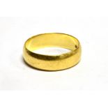 A HALLMARKED 22CT GOLD PLAIN WEDDING BAND the D profile band 5.5mm, ring size M, weighing approx.