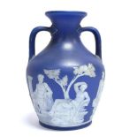 A VICTORIAN WEDGWOOD JASPERWARE MODEL OF THE PORTLAND VASE impressed 'WEDGWOOD' to base, 19cm high