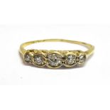 A DIAMOND FIVE STONE 18CT YELLOW GOLD RING The five round old cut diamonds weighing a total of