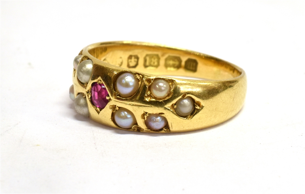 A VICTORIAN RUBY AND SEED PEARL SET 18CT GOLD BAND RING Small ruby to centre with half round seed - Image 3 of 4