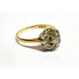 A DIAMOND ROUND CLUSTER 18CT YELLOW GOLD RING A total of seven round brilliant cut diamonds with a