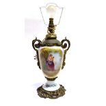 A VICTORIAN GILT METAL MOUNTED OIL LAMP converted to electricity, the porcelain vase body painted