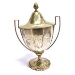 A SPANISH SILVER GOLF TROPHY cup inscription for 1926 of faceted lidded form, the pedestal base