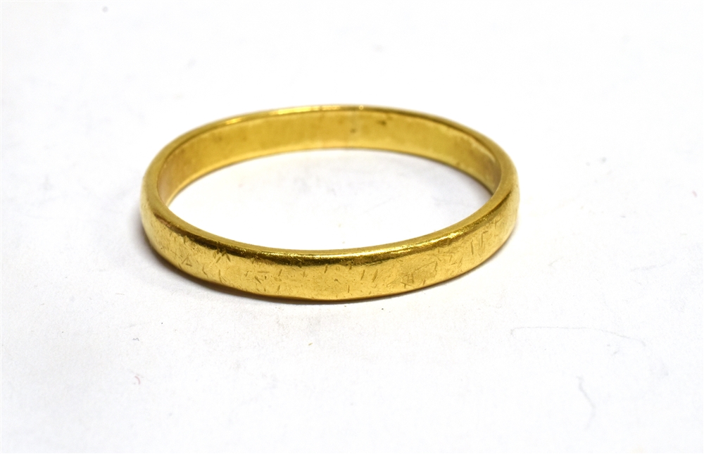 A HALLMARKED 22CT GOLD PLAIN WEDDING BAND the D profile band 3mm wide, weighing approx. 3.1grams