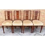 A SET OF FOUR EDWARDIAN MAHOGANY DINING CHAIRS with pierced and inlaid splat backs, upholstered