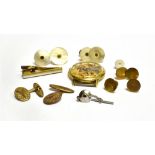 A SET OF FOUR 9CT GOLD GENT'S DRESS STUDS each stamped 9c, weighing a total of approx. 4.9 grams,