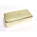 A SILVER RECTANGULAR CIGARETTE BOX Of plain form, block engraved to winged lid, W.M-D 1896, cedar