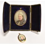 A YELLOW GOLD OVAL PORTRAIT LOCKET portrait of a Victorian lady, painted on ivory, to yellow gold