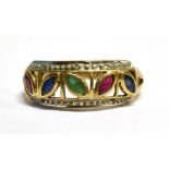 A 9CT GOLD RUBY SAPPHIRE AND EMERALD SET DRESS RING size T, gross weight approx. 2.4 grams.
