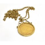 A HALF SOVEREIGN GOLD PENDANT AND CHAIN the coin dated 1905, to plain bezel 9 carat gold mount,