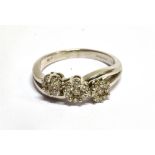 A DIAMOND TRIPLE CLUSTER 9 CARAT WHITE GOLD RING total diamond weight 0.50 carat stamped, ring