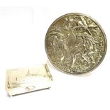 A WHITE METAL FIGURAL SCENE WALL PLAQUE the cast silver plated front depicting Adam and Eve and