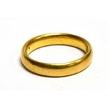 A 22 CARAT YELLOW GOLD PLAIN WEDDING BAND the uniform D profile band 4mm wide, hallmarked 22 carat