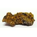 A WULFENITE MINERAL SPECIMEN San Francisco Mine, Mexico, cabinet size 12cm x 7cm x 4.5cm.