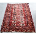 TWO RED GROUND BOKHARA RUGS 167cm x 115cm and 163cm x 110cm