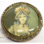 A LATE NINETEENTH/EARLY TWENTIETH CENTURY BROOCH/PENDANT with a portrait miniature of a young lady