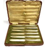 A BOXED SET OF SIX ELKINGTON & CO SILVER HANDLED BUTTER KNIVES 1915, complete in original box.