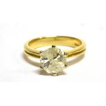 A 1.5 CARAT DIAMOND SOLITAIRE 18CT GOLD RING the round brilliant cut diamond assessed as L/M colour,