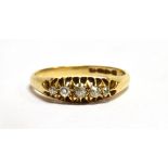 A DIAMOND FIVE STONE 18CT GOLD BOAT HEAD RING Chester, hallmarked for 1913, ring size O, gross