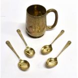 A SILVER CHRISTENING MUG together with a set of four small silver coffee spoons, total weight