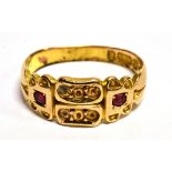 A 15 CARAT GOLD RING set with two small rubies, ring size L, gross weight 2.7 grams. Condition