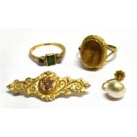 FOUR ITEMS OF GOLD JEWELLERY Comprising a 9ct stamped ring and 9c marked etruscan brooch combined