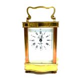 A FRENCH LACQUERED BRASS 8-DAY CARRIAGE CLOCK the enamel dial with Roman and Arabic numerals, signed