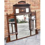 A VICTORIAN ROSEWOOD OVERMANTLE MIRROR with marquetry inlaid decoration, 145cm wide, 140cm high