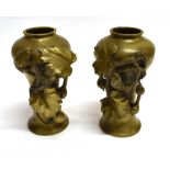 A PAIR OF BRASS VASES OF BALUSTER FORM with relief decoration of a frog and foliage, 16cm high