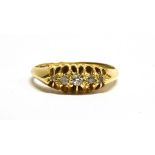 A DIAMOND BOAT HEAD 18 CARAT GOLD RING five small old cut diamonds, ring size M, gross weight 3.4
