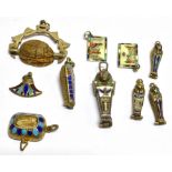 TEN SMALL ITEMS OF SILVER AND ENAMELLED EGYPTIAN STYLE JEWELLERY comprising five mummy pendants of