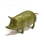 A PATINATED BRONZE FIGURE OF A PIG 17cm long snout to tail