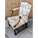 A MAHOGANY FRAMED 'GAINSBOROUGH' TYPE UPHOLSTERED ARMCHAIR on chamfered square supports with H-shape