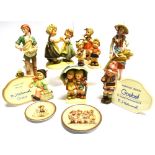 A COLLECTION OF HUMMEL/GOEBEL FIGURES including a pair modelled as male and female peasants 21cm