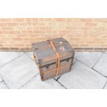 A SMALL VICTORIAN LEATHER BOUND DOME TOP TRUNK with original lift-out fitted interior, 54cm wide